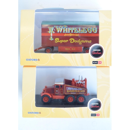 214 - Fourteen boxed 1/76 scale OO gauge diecast vehicle models from Oxford Diecast Showtime range to incl... 