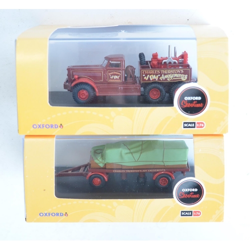 214 - Fourteen boxed 1/76 scale OO gauge diecast vehicle models from Oxford Diecast Showtime range to incl... 