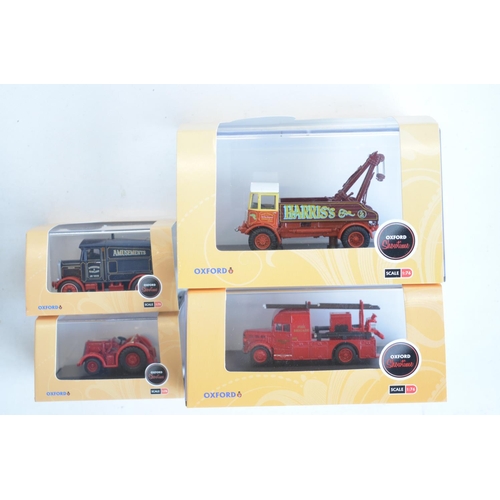 215 - Fourteen boxed 1/76 scale OO gauge diecast vehicle models from Oxford Diecast Showtime range to incl... 