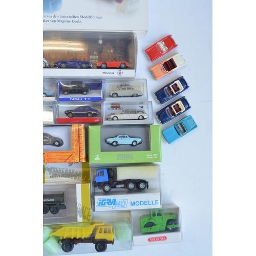 221 - Collection of 53 boxed mostly plastic 1/87 scale OO gauge vehicle models from Wiking, Herpa, Brekina... 