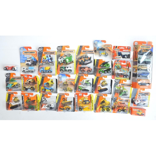 249 - Twenty six boxed Matchbox vehicles, mostly from the MBX Construction to include 5 vehicle Service Sq... 