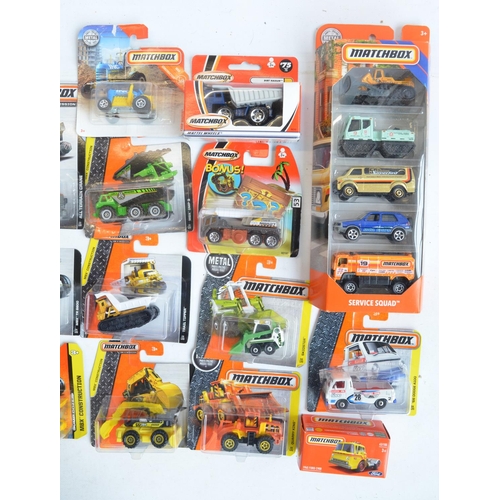 249 - Twenty six boxed Matchbox vehicles, mostly from the MBX Construction to include 5 vehicle Service Sq... 