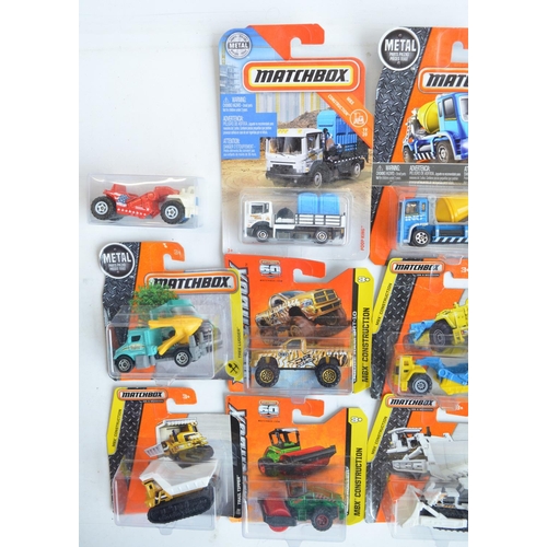 249 - Twenty six boxed Matchbox vehicles, mostly from the MBX Construction to include 5 vehicle Service Sq... 