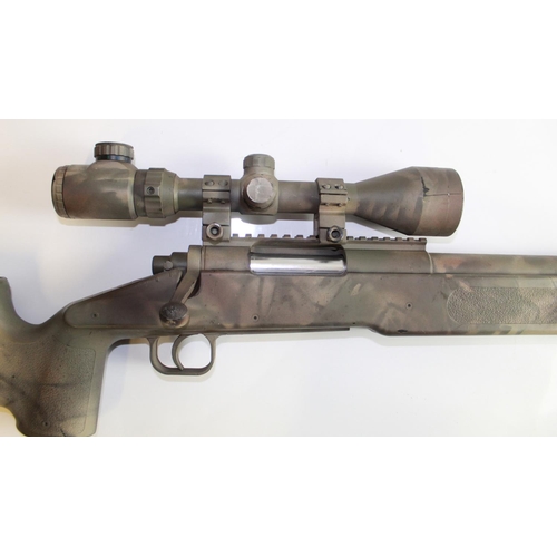 544 - Bolt action spring loading air soft urban snipers rifle. With scope, three magazines, and a jar of p... 