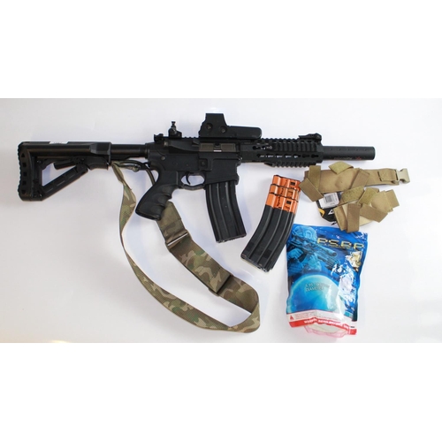 545 - Air soft Urban assault machine gun. Comes with four magazines, chargers and li-po battery packs and ... 