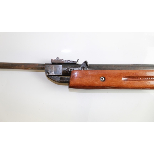 556 - .22 Break barrel air rifle. No visible makers name. Barrel length 19ins, overall length 43ins