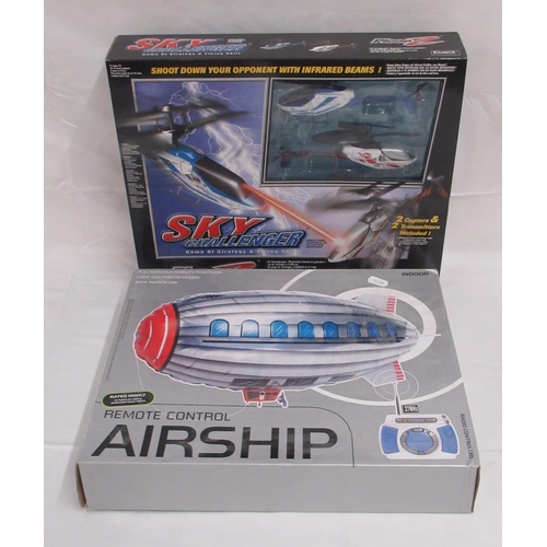 343 - Indoor remote control airship, box opened all parts appear present and in good condition, and a Silv... 