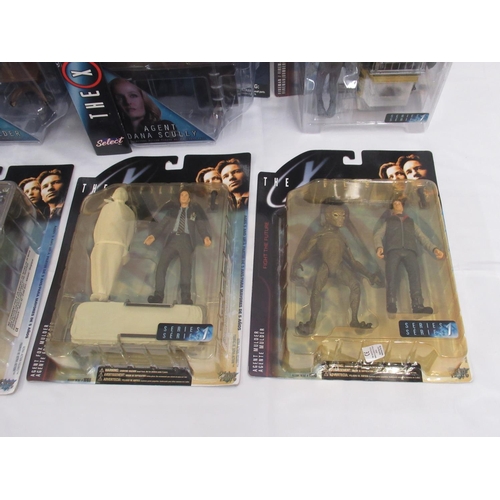 351 - The X-Files - 4 McFarlane toys cased X-Files action figures, yellowing to cases and some wear, cases... 