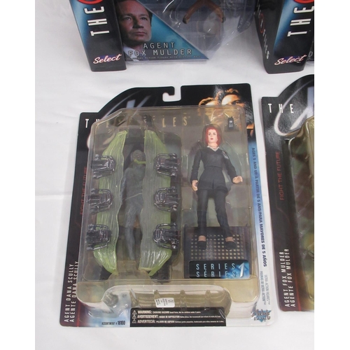 351 - The X-Files - 4 McFarlane toys cased X-Files action figures, yellowing to cases and some wear, cases... 