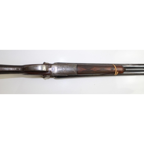 562 - 12 bore Marco S/S hammer Shotgun.(Break on forend) Barrel length 28ins  14ins Length of pull.  Shotg... 