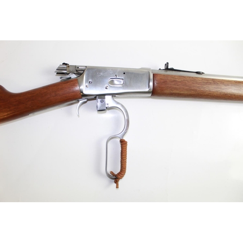 571 - Rossi 38/357 Under lever Action rifle. Stainless steel finish, wooden stock and fore-end. Overall le... 