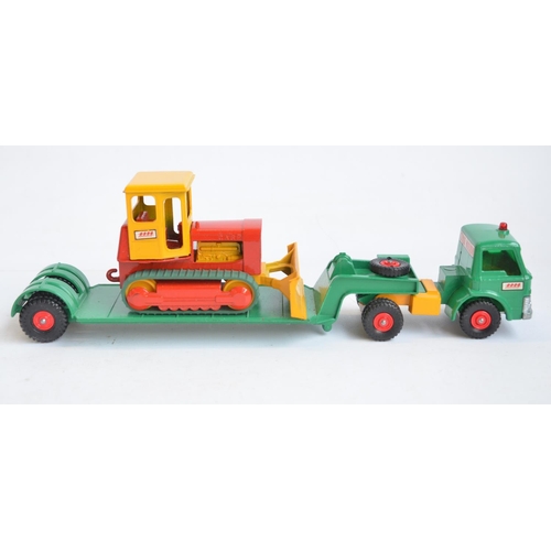 255 - Two vintage boxed Matchbox diecast model trucks to include K-16 Dodge tractor with twin tipper train... 