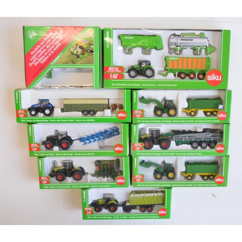 260 - Nine boxed 1/87 scale (HO gauge) diecast farming models from Siku to include 1882 Krone self propell... 