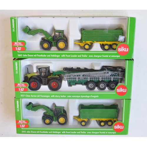 260 - Nine boxed 1/87 scale (HO gauge) diecast farming models from Siku to include 1882 Krone self propell... 