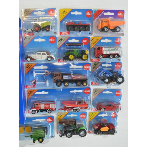 261 - Twenty four boxed diecast vehicle models from Siku to include farming, commercial, emergency etc. Al... 