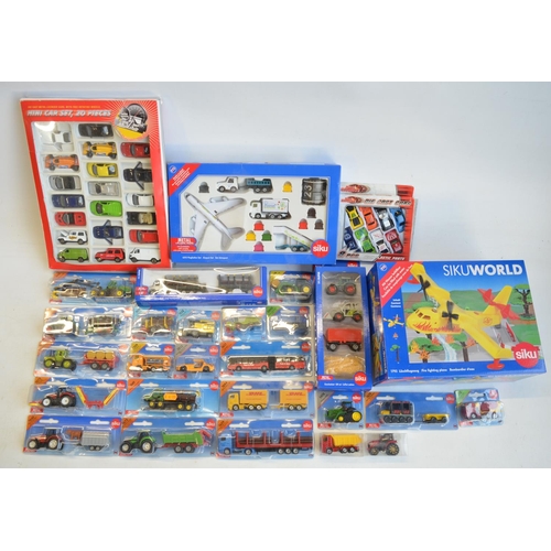 262 - Twenty four boxed model sets from Siku to include diecast series models, a Siku World 1793 fire figh... 