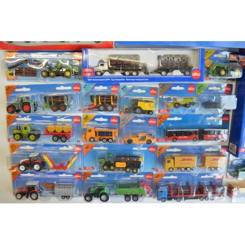 262 - Twenty four boxed model sets from Siku to include diecast series models, a Siku World 1793 fire figh... 