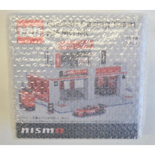 264 - Tomica Town 1/64 scale Nissan racing team Nismo pit as new in original outer shipping bubble wrap, n... 