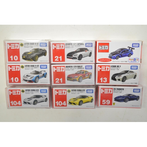 266 - Eighteen boxed small scale diecast model car sets from Takara Tomy, all Japanese imports to include ... 