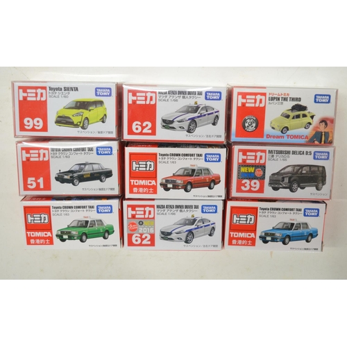 270 - Thirty boxed diecast small scale models from Takara Tomy, all Japanese imports to include an event m... 