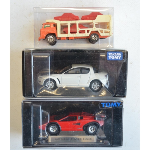 273 - Twenty two boxed diecast model vehicles from Takara Tomy, all Japanese imports to include 5x Premium... 