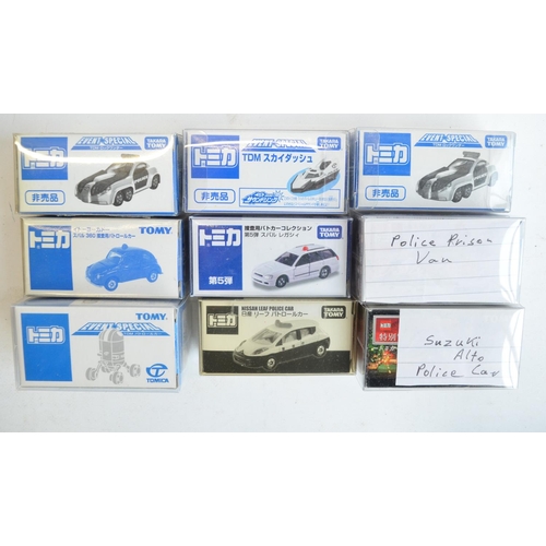 275 - Thirty boxed diecast model vehicles/sets from Takara Tomy, all Japanese imports to include Police ve... 