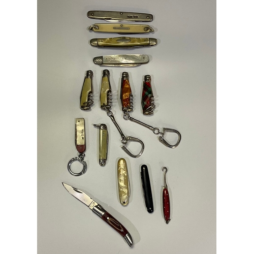 594 - Collection of miniature knifes with various handles, including silver fruit knife, “bottle” knifes a... 