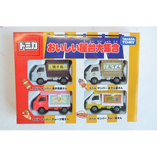 284 - Thirty boxed Japanese imported small scale diecast models from Takara Tomy to include 4 vehicle mult... 