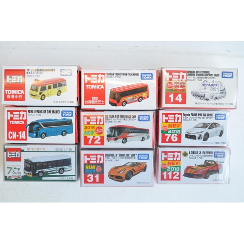 284 - Thirty boxed Japanese imported small scale diecast models from Takara Tomy to include 4 vehicle mult... 