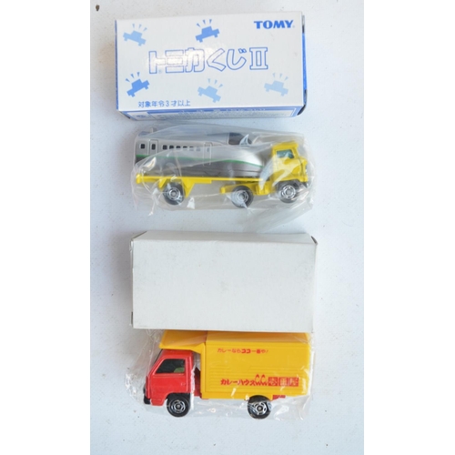 284 - Thirty boxed Japanese imported small scale diecast models from Takara Tomy to include 4 vehicle mult... 