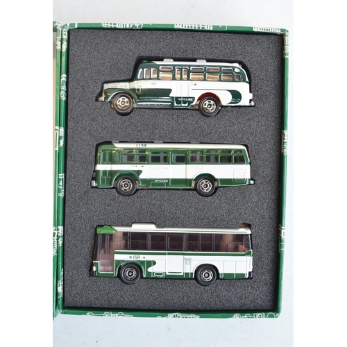 285 - Twenty nine boxed Japanese imported small scale diecast models from Takara Tomy to include 3 bus mul... 