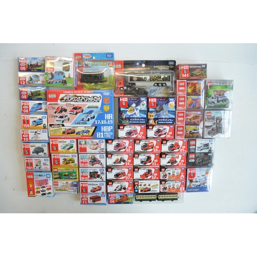 293 - Fifty boxed Japanese imported small scale Takara Tomy diecast models to include TV/film related mode... 