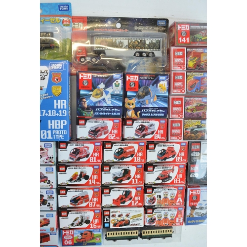 293 - Fifty boxed Japanese imported small scale Takara Tomy diecast models to include TV/film related mode... 