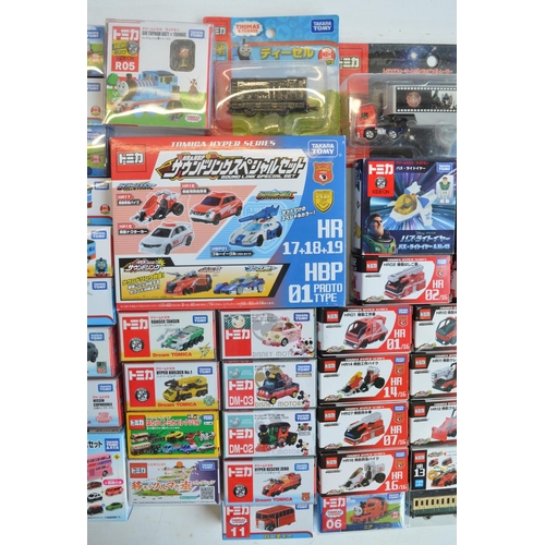 293 - Fifty boxed Japanese imported small scale Takara Tomy diecast models to include TV/film related mode... 