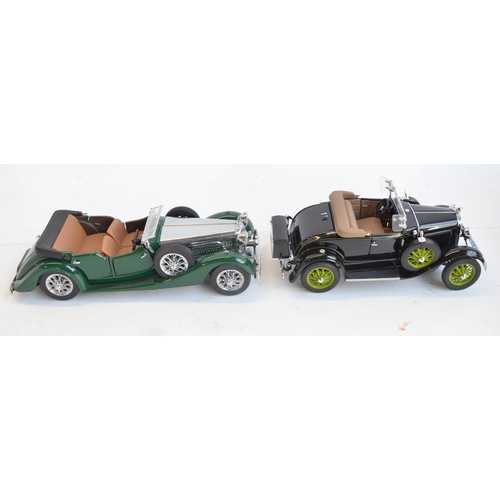 296 - 2 boxed 1/24 scale  diecast model cars to include Franklin Mint 1938 Alvis 4.3 Ltr and Danbury Mint ... 