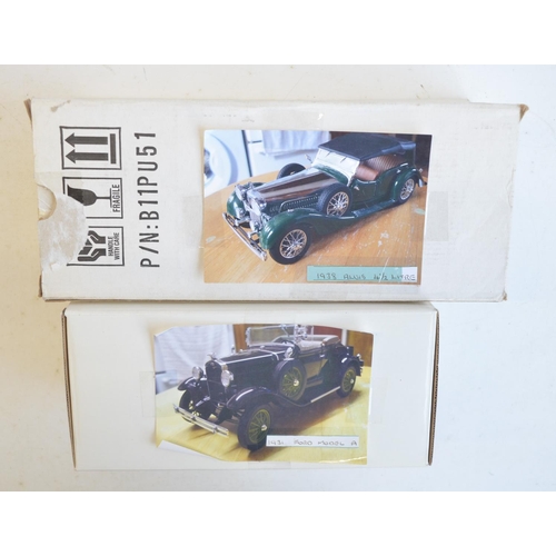 296 - 2 boxed 1/24 scale  diecast model cars to include Franklin Mint 1938 Alvis 4.3 Ltr and Danbury Mint ... 