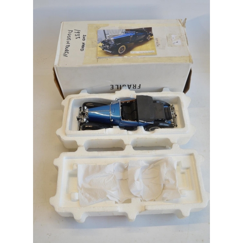 297 - 2 boxed 1/24 scale diecast model cars to include Danbury Mint 1932 Cadilac V-16 Sport Phaeton and Fr... 