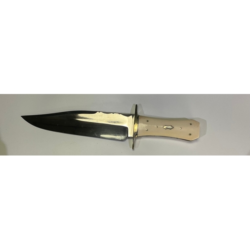 606 - Hand forged display Bowie knife with polished steel blade, brass cross guard and “coffin” shaped han... 