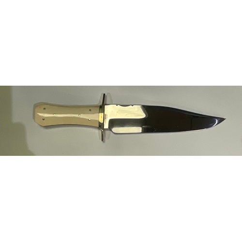 606 - Hand forged display Bowie knife with polished steel blade, brass cross guard and “coffin” shaped han... 