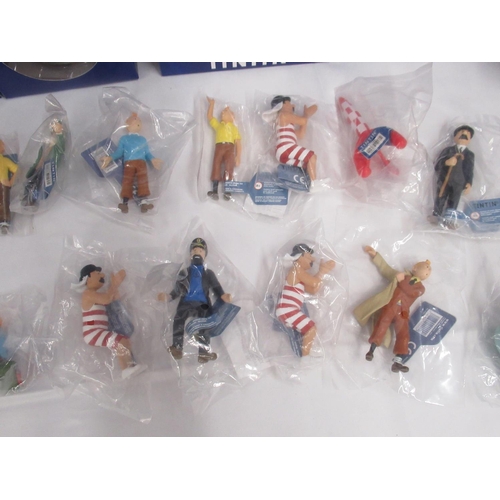 397 - Tintin - 12 Moulinsart boxed figurines, in good to near mint condition most boxes still sealed, boxe... 