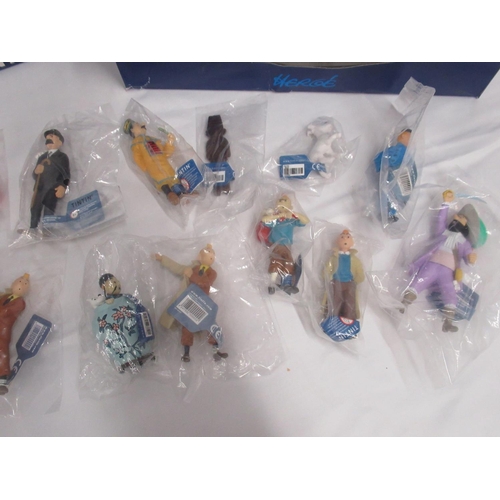 397 - Tintin - 12 Moulinsart boxed figurines, in good to near mint condition most boxes still sealed, boxe... 