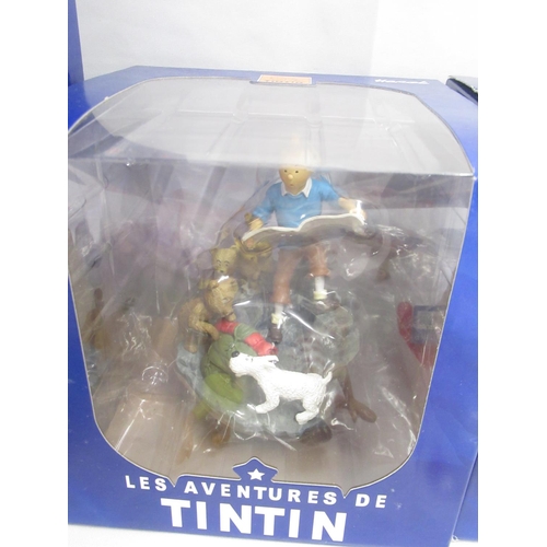 397 - Tintin - 12 Moulinsart boxed figurines, in good to near mint condition most boxes still sealed, boxe... 