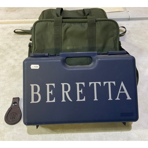 641 - Beretta hard case cartridge box 2x Beretta canvas cartridge cases and a leather Beretta gun foot res... 