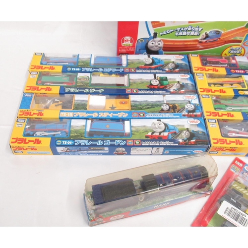 325 - Thomas the Tank Engine - Takara TOMY boxed and cased trains and carriages (9), a boxed track set and... 