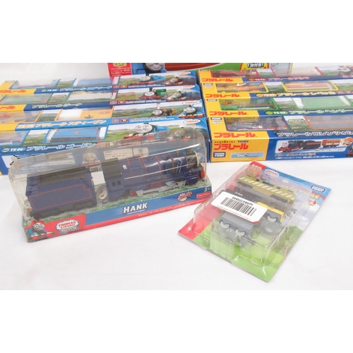 325 - Thomas the Tank Engine - Takara TOMY boxed and cased trains and carriages (9), a boxed track set and... 