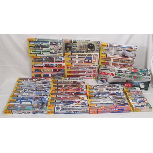 327 - Large collection of Takara TOMY Japanese Import boxed trains and carriages, (89 in 3 boxes)