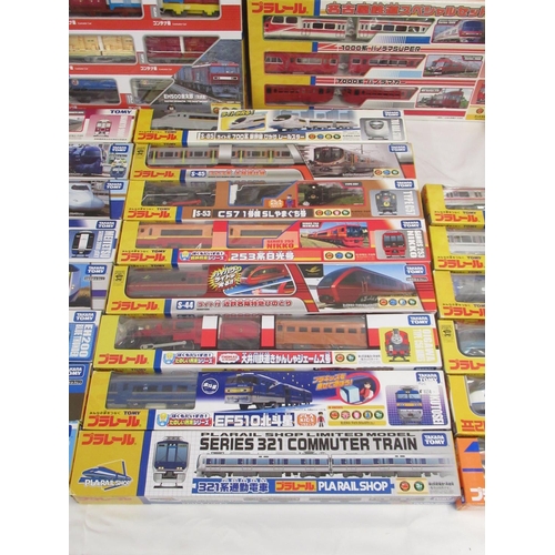 327 - Large collection of Takara TOMY Japanese Import boxed trains and carriages, (89 in 3 boxes)