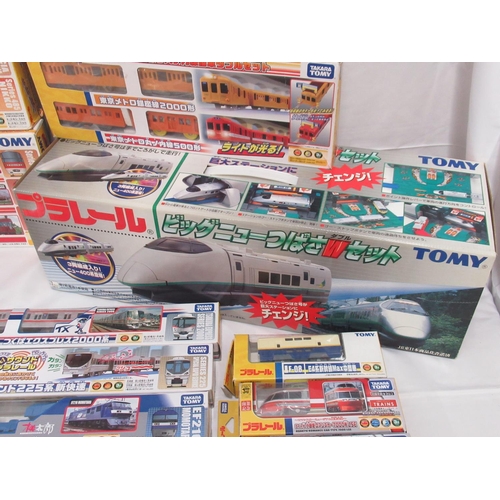 327 - Large collection of Takara TOMY Japanese Import boxed trains and carriages, (89 in 3 boxes)