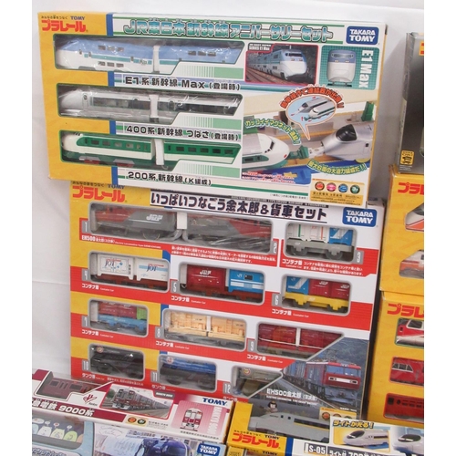 327 - Large collection of Takara TOMY Japanese Import boxed trains and carriages, (89 in 3 boxes)