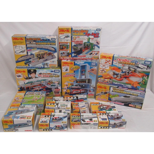 328 - 16 boxed Takara TOMY Japanese import boxed train stations and buildings, some opened some sealed, al... 